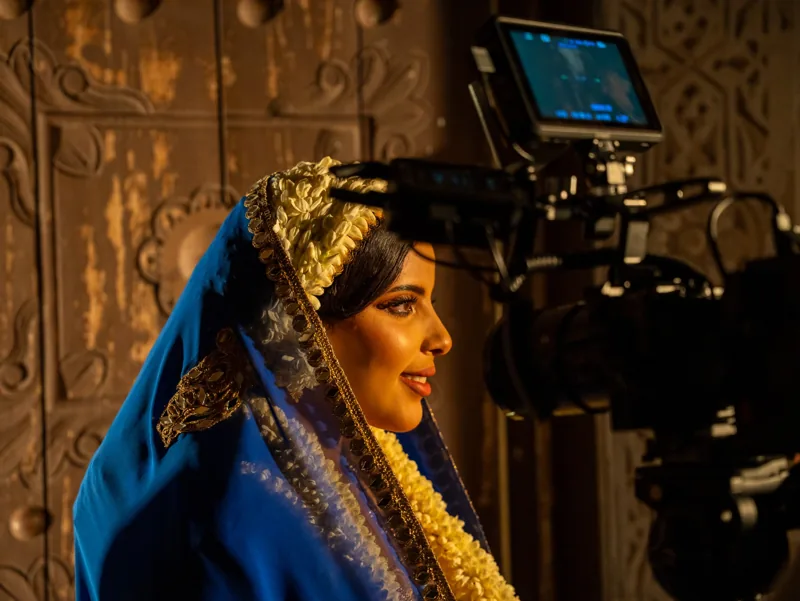 The camera during a scene from the commercial.